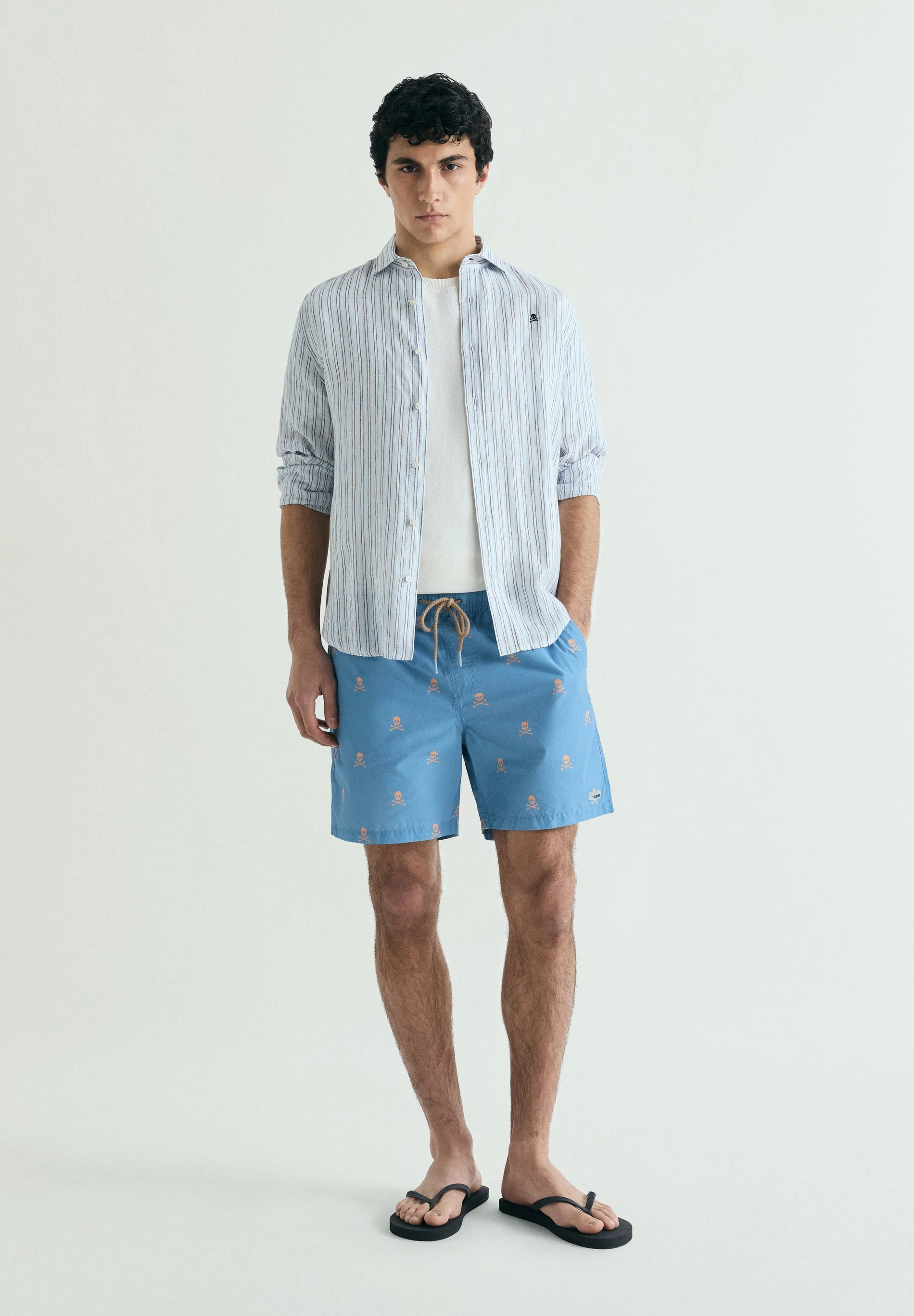 CONTRAST SKULL SWIMMING TRUNKS