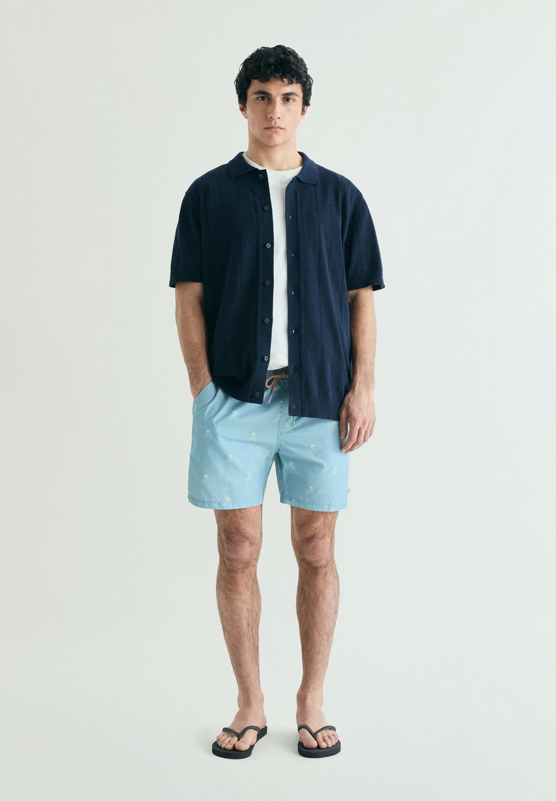CONTRAST SKULL SWIMMING TRUNKS