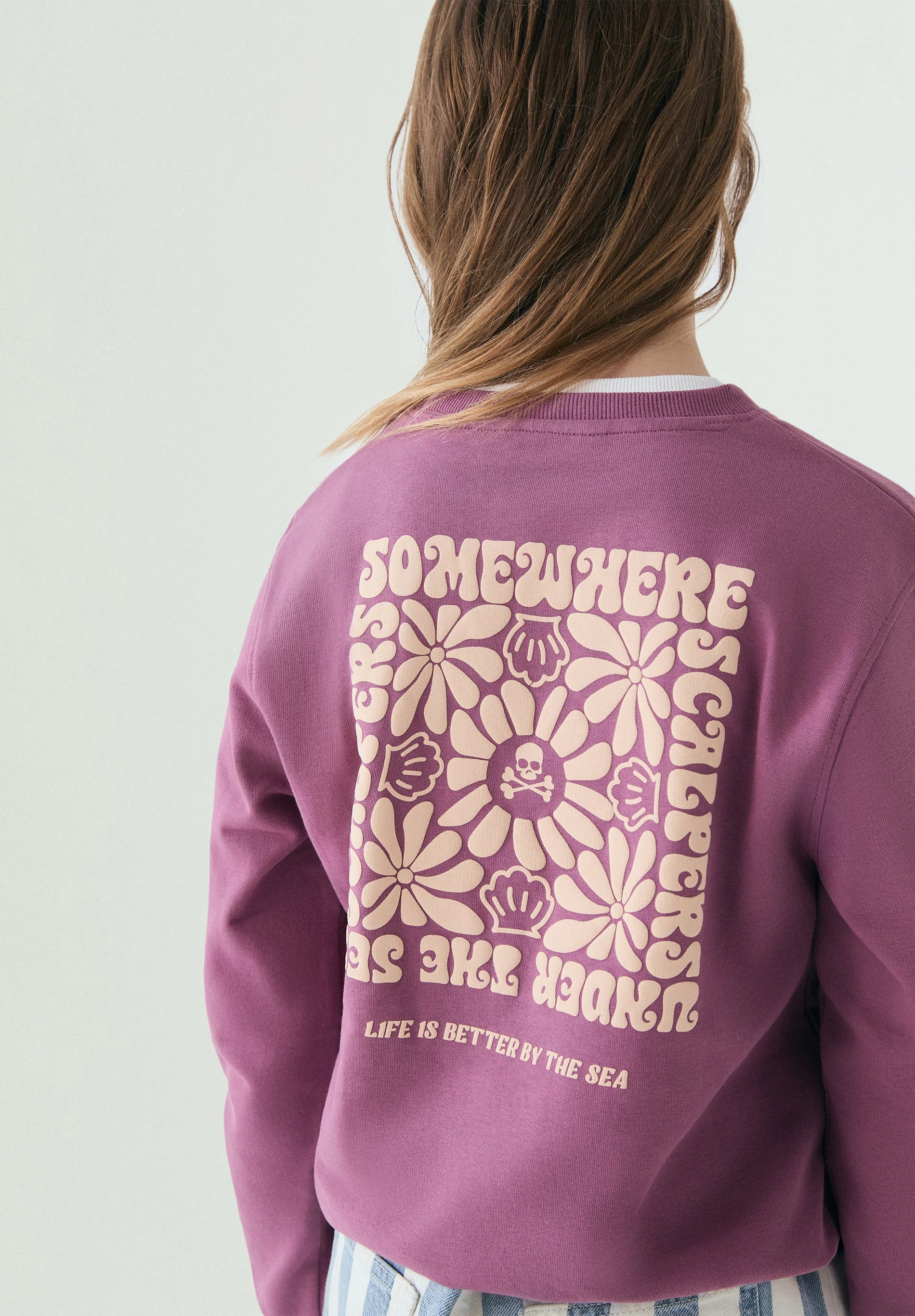 ADJUSTABLE DRAWSTRING SWEATSHIRT