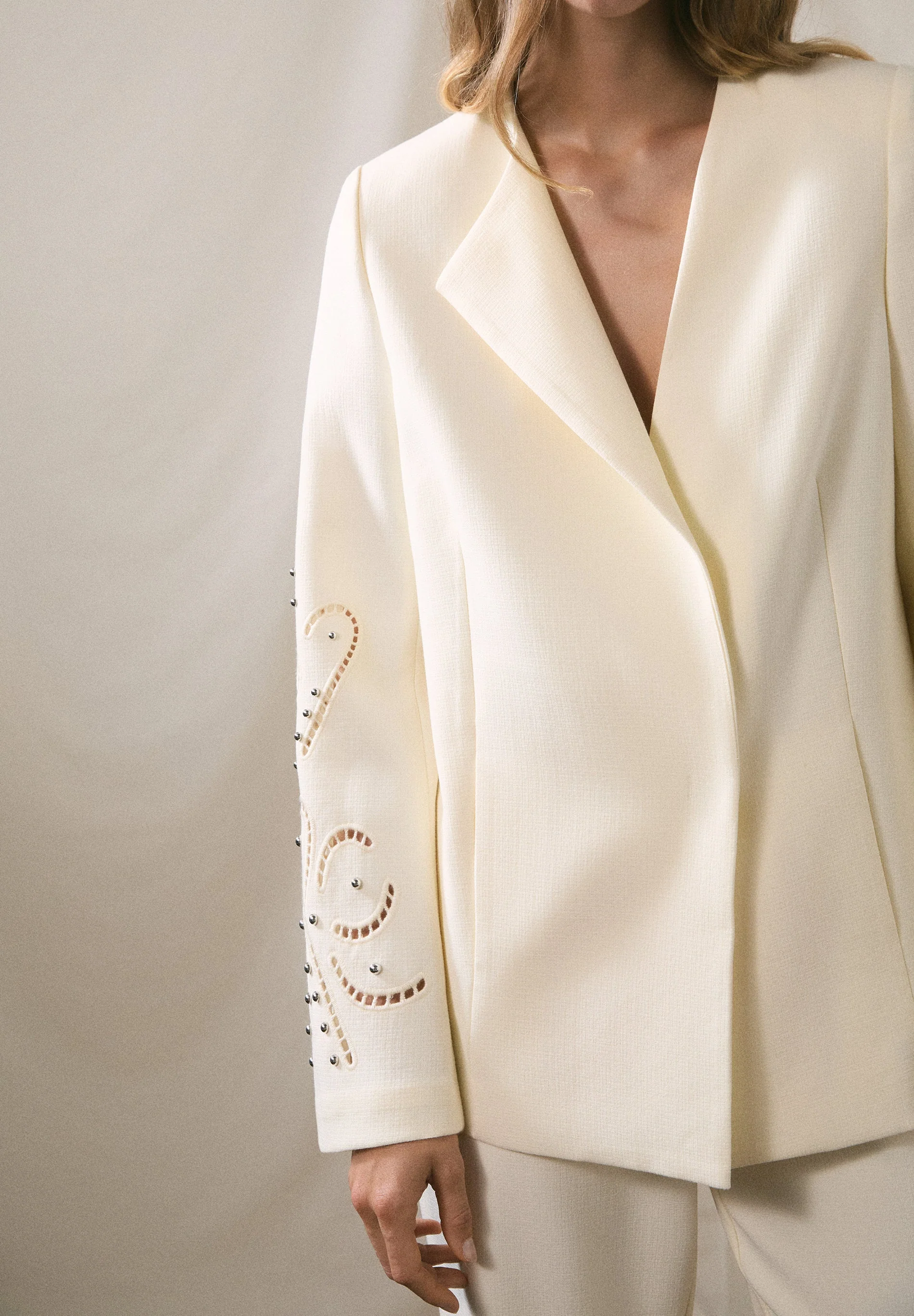 BLAZER WITH PERFORATED DETAILS